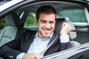 Seat-Belt portrait of an handsome man on his car