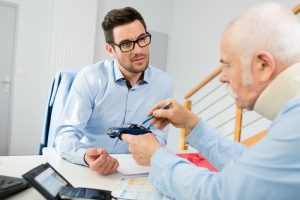 Client,With,Neck,Braces,Talking,Bout,Car,Insurance auto accident lawyer Utah