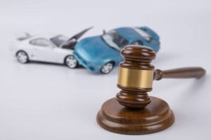 Hammer,Of,The,Judge.,Two,Collided,Cars,On,A,White car accident lawyer