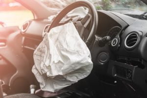 Airbag,Exploded,At,A,Car,Accident,And,Illuminated liability airbags failed deploy