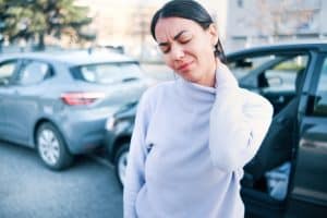 Woman,Suffering,Injury,After,Car,Crash,Fender,Bender pain suffering damages car accidents