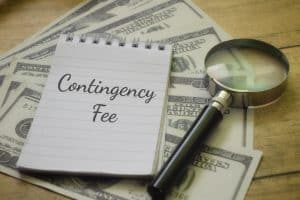 Contingency,Fee,Wording,With,Magnifying,Glass,And,Money.,Business,Concept personal injury legal costs covered