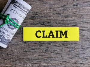 Business,And,Finance,Concept.,Phrase,Claim,Written,On,Sticky,Note filing claims government entities